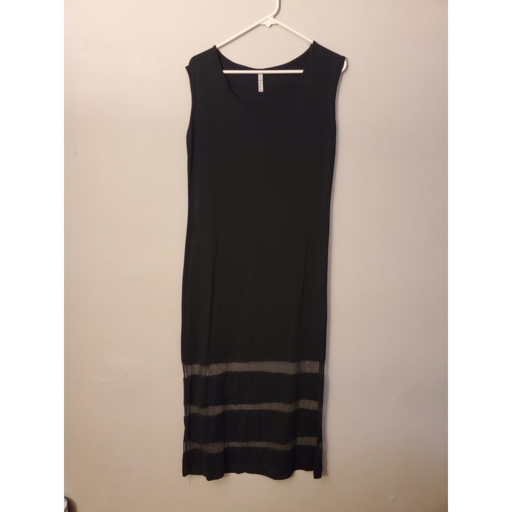 Black tea length dress with sheer detail on bottom